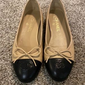 Chanel flats size 37 good used condition.  Tan and Black Captoe.